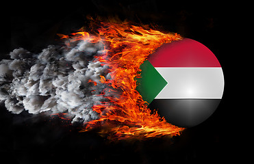 Image showing Flag with a trail of fire and smoke - Sudan