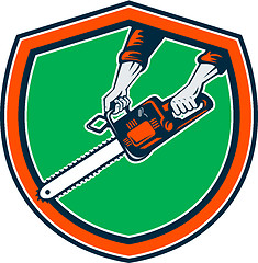 Image showing Hand Holding Chainsaw Shield Retro