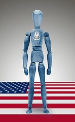 Image showing Wood figure mannequin with US state flag bodypaint - Louisiana
