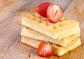 Image showing homemade waffles with strawberries