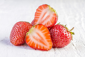 Image showing strawberries on white wooden 