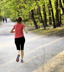 Image showing Young female jogger