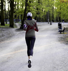 Image showing Young female jogger