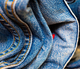 Image showing stitching on blue jeans