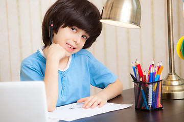 Image showing child doing homework