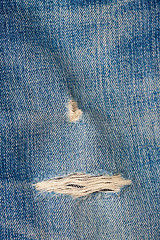 Image showing jeans with a hole