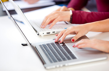 Image showing Female hands on a keyboard