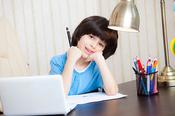 Image showing schoolboy doing homework