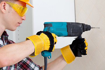 Image showing worker with rock-drill