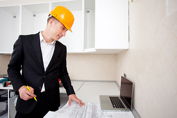 Image showing civil engineer working with documents