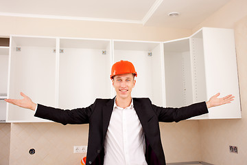 Image showing smiling foreman shows interior