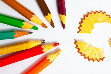 Image showing set of a old colored pencils with shavings
