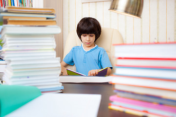 Image showing boy reading a book