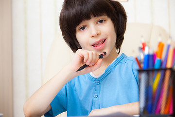 Image showing Boy doing homework