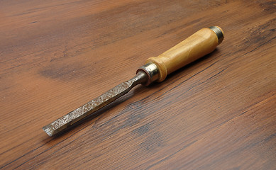 Image showing CHisel on wood