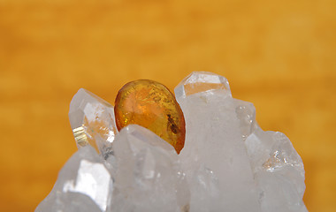 Image showing Amber on rock crystal