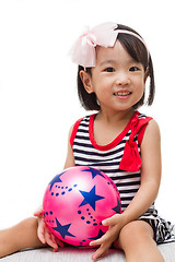 Image showing Asian Chinese Girl Holding Ball