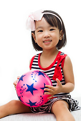 Image showing Asian Chinese Girl Holding Ball