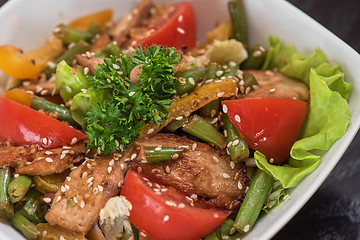 Image showing Warm salad with chicken