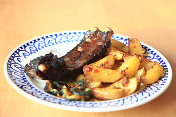 Image showing grilled ribs and potatoes 