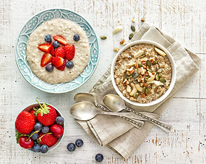Image showing two bowls of various porridge for healthy breakfast