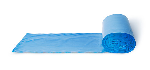 Image showing Roll of blue plastic garbage bags in front view