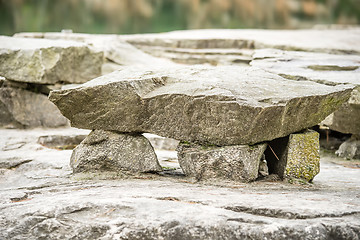 Image showing natural stone bench in the park