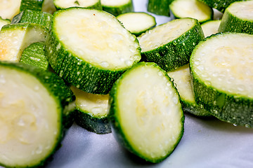 Image showing sliced zucchini prepared for grilling on a picnic