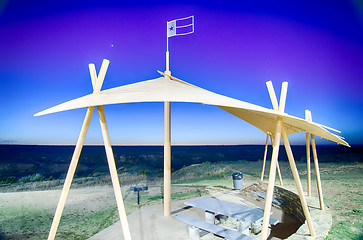 Image showing picnic area in texas with gazebo overlooking canyon after sunset