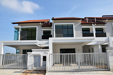 Image showing Terrace house under the blue skies