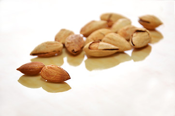 Image showing Almonds on the white floor