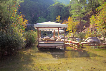 Image showing Unusual restaurant with tables in  water