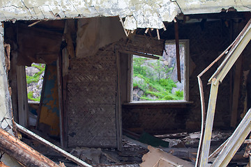 Image showing Ruins of a house in the mountains is a symbol of desolation