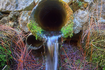 Image showing Laid under the road downpipe