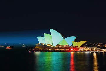 Image showing Sydney Opera House illuminated ilight green and aqua