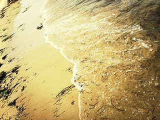 Image showing Sandy beach and sea wave