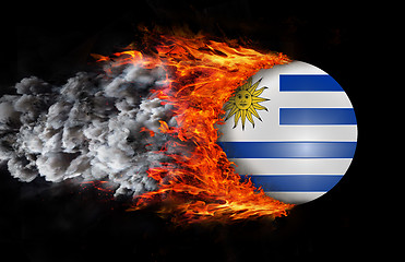 Image showing Flag with a trail of fire and smoke - Uruguay