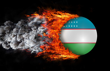 Image showing Flag with a trail of fire and smoke - Uzbekistan