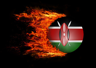 Image showing Flag with a trail of fire - Kenya