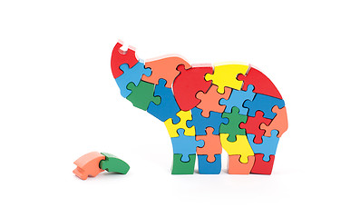 Image showing Colorful puzzle pieces in elephant shape