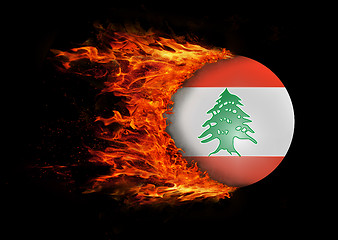 Image showing Flag with a trail of fire - Lebanon