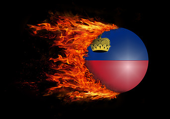 Image showing Flag with a trail of fire - Liechtenstein