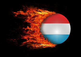 Image showing Flag with a trail of fire - Luxembourg