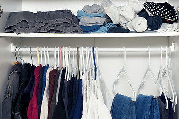 Image showing inside wardrobe with shelf