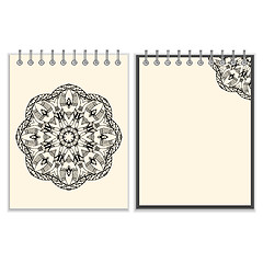 Image showing White cover notebook with handmade black pattern