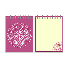 Image showing Purple cover notebook with round florwer pattern