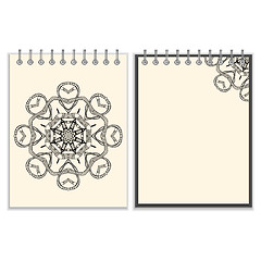 Image showing White cover notebook with handmade black pattern