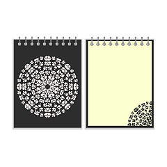 Image showing Black cover notebook with round pattern