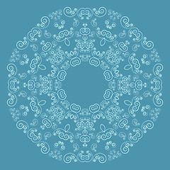Image showing Round lacy pattern on blue background