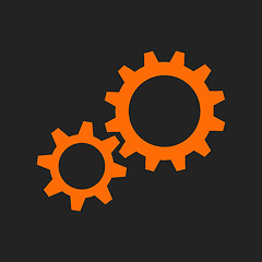 Image showing Orange gear wheels on black